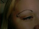 eyebrow piercing on master mandy...ahhh look out for the whip!! yum sauce!!