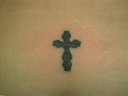 black cross on lower back