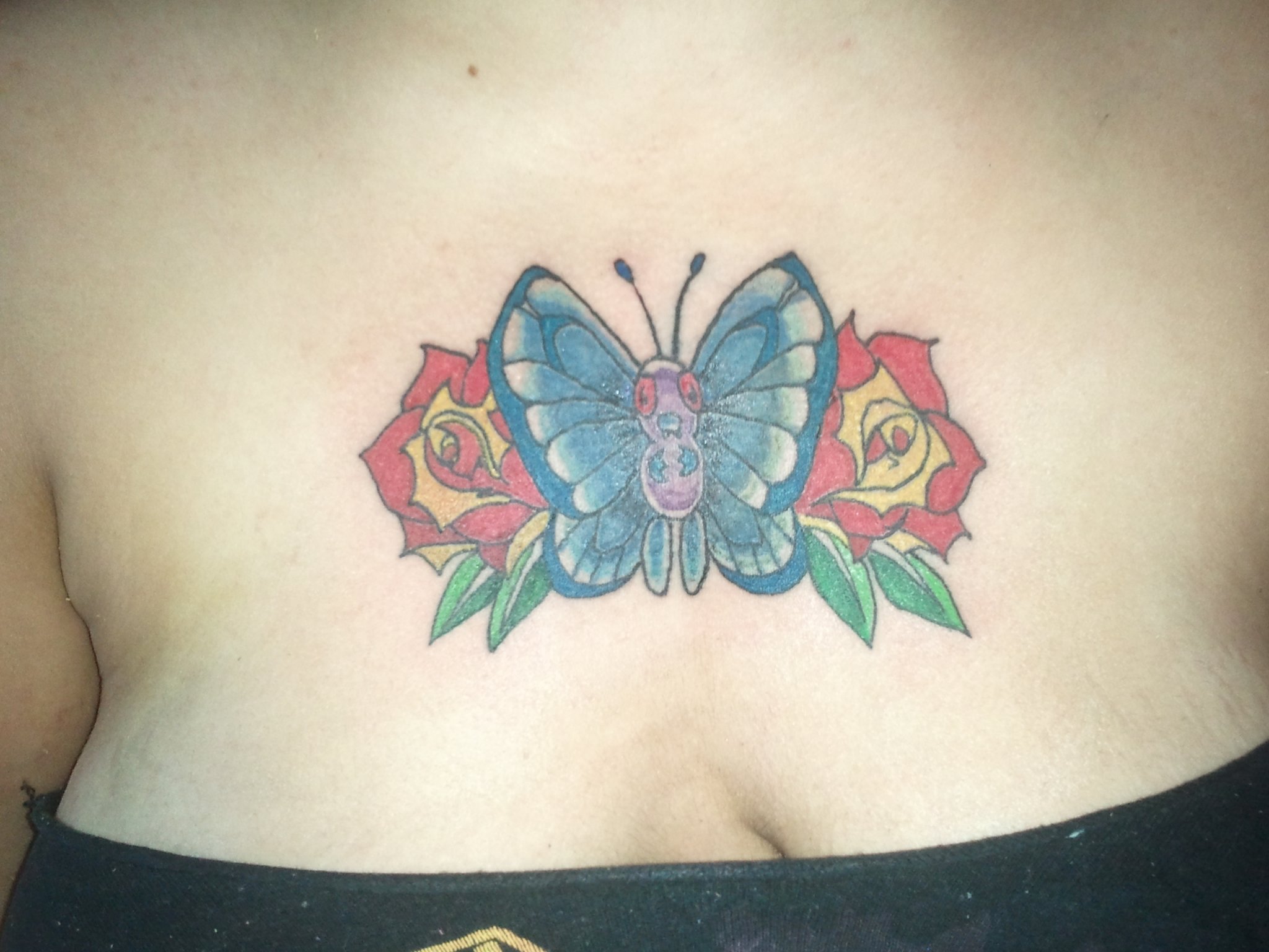 Beautiful Butterfly chest piece on my lil' Seester!