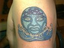 sublime moon- this guy has the sublime sun on the opposite arm