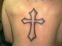 tribal cross on the center of the back